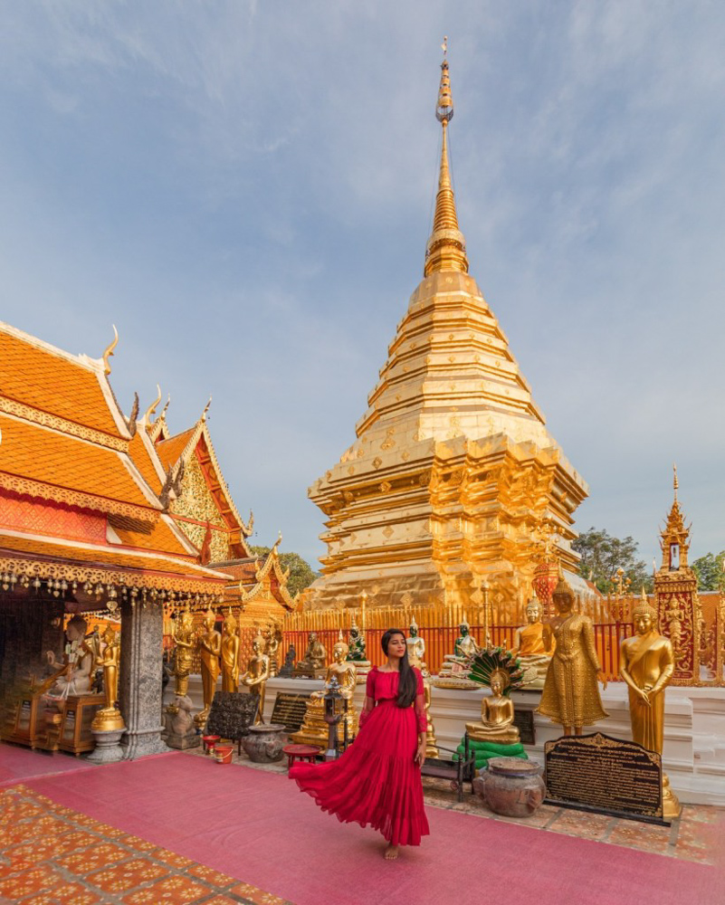 A girl in red dress at Wat Phra Doi Suthep