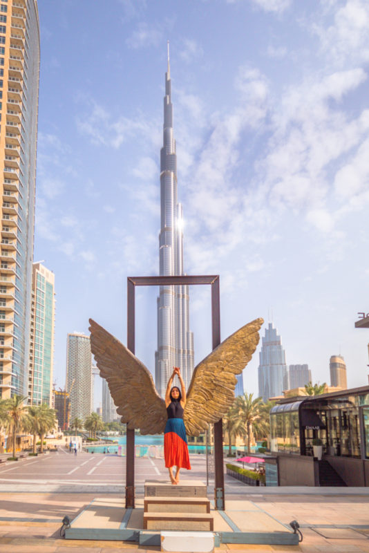 A girl posing at Wings of Mexico at Downtown in Dubai
