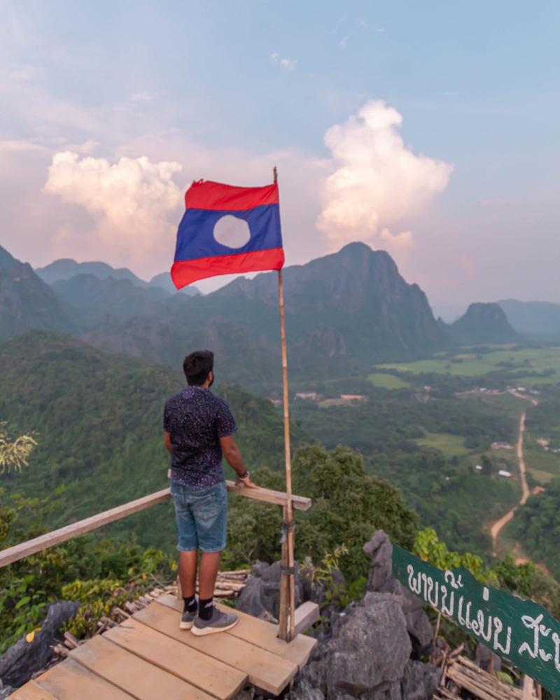 A man standing on the top of Nam Xay viewpoint
