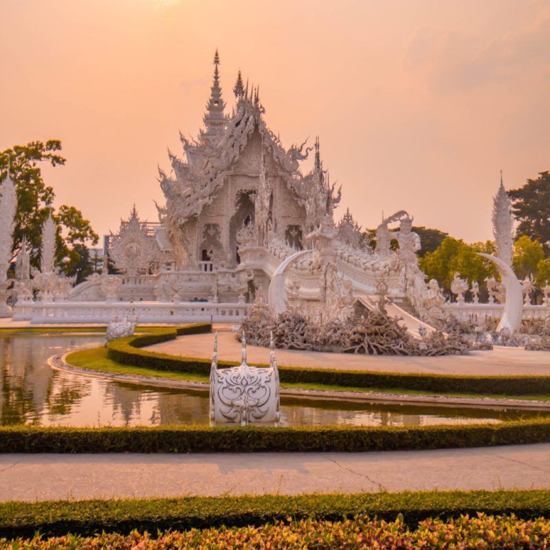 The view of white temple at sunset