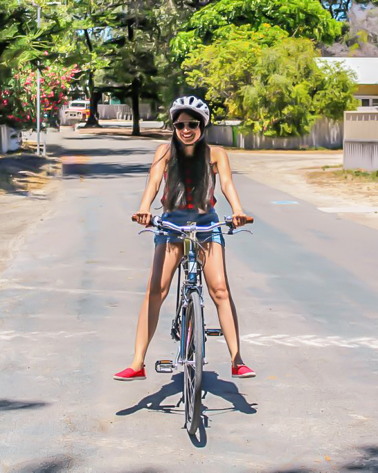 A girl on a cycle at Rottnest island australia