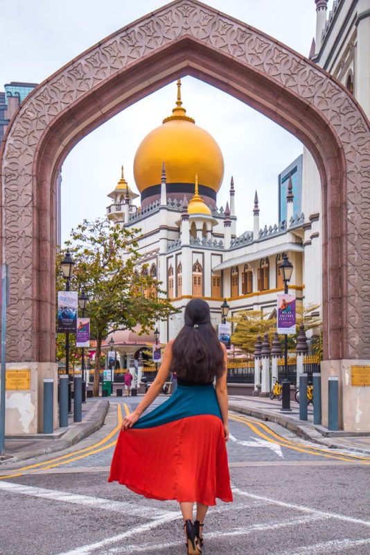A girl in front of Masjid sultan mosque, one of the best singapore instagram spots