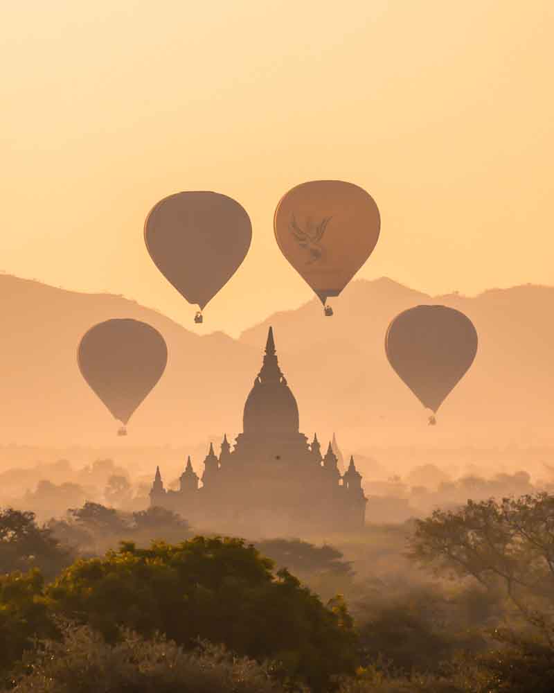 The stunning early morning view of hot air balloon and a temple in Bagan, Myanmar